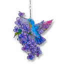 Colibri en flores violetas.webp