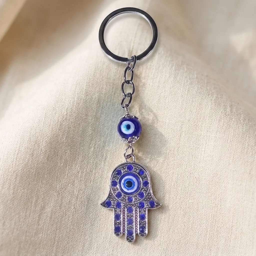 PROMO X12 - Llavero Mano Fátima Azul (11x3cm)